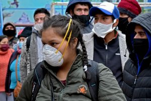 Comienza traslado de migrantes peruanos a colegios católicos del Arzobispado de Santiago